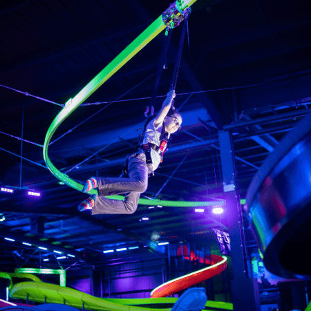 school pupil on an indoor UV air glider