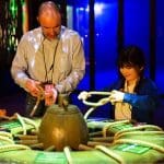 teacher and school pupil solving an immersive experience challenge
