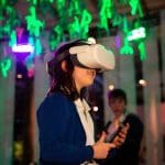 school trip pupil wearing immersive head set