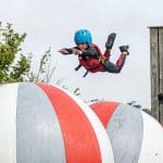school pupil on a water assault course
