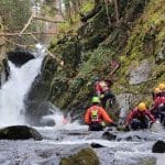 school group doing gorge walking in Wales