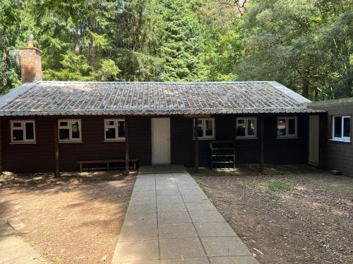wooden lodge accommodation block Bentley Copse