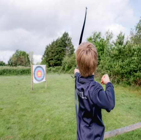 pupil on an archery field